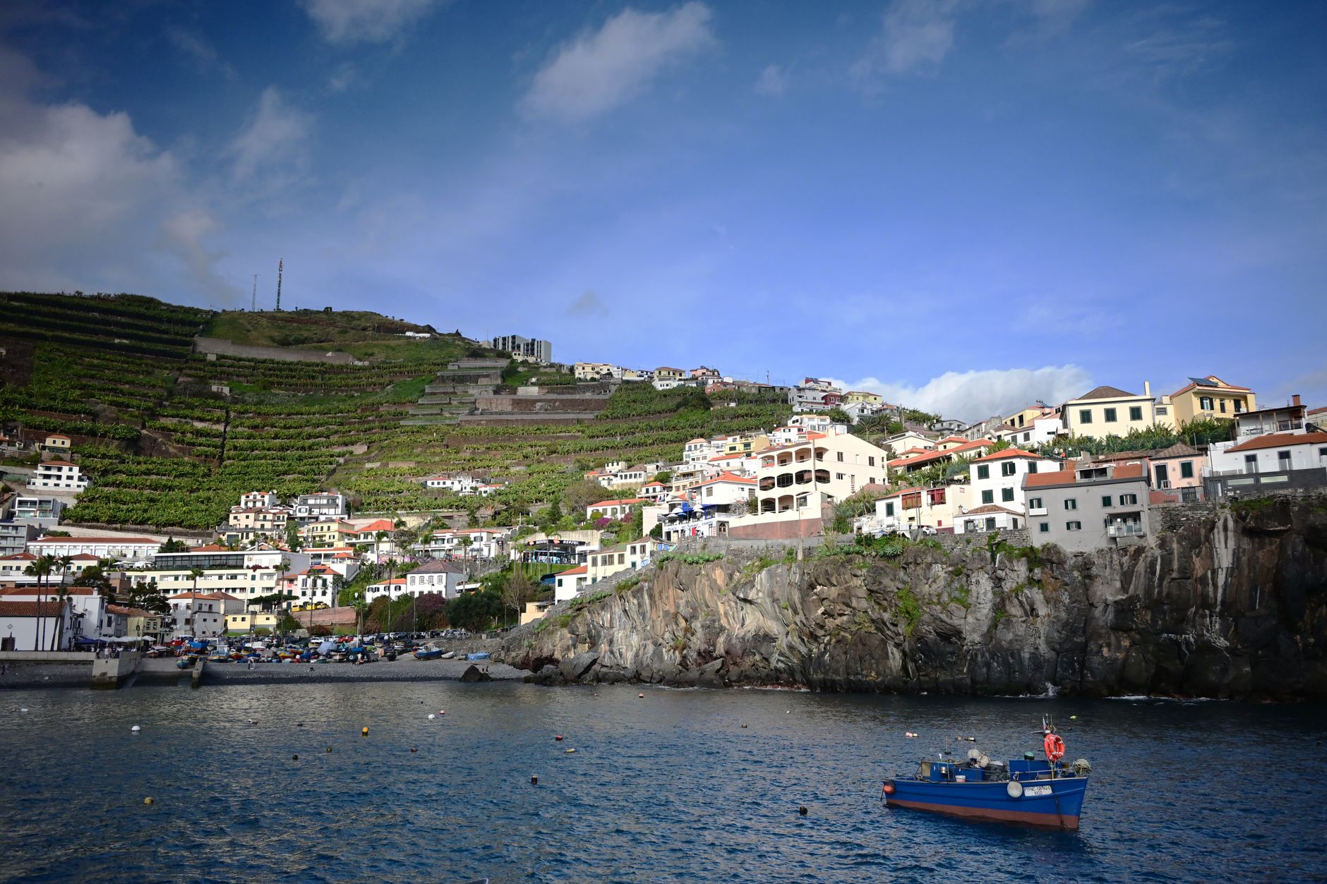Madeira, Portugal - Charming coastal village in Madeira, Portugal, featuring terraced vineyards and 