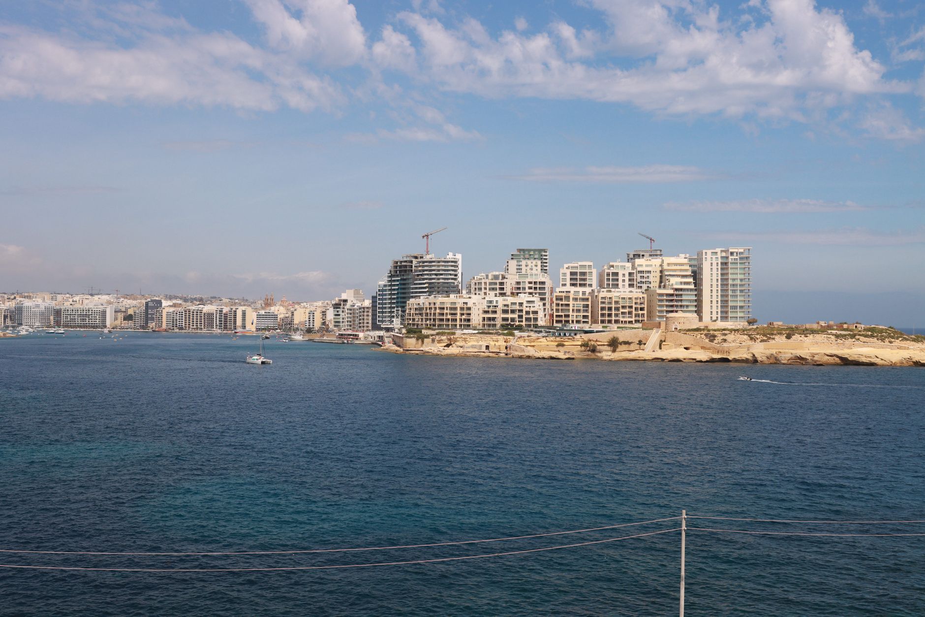 Malta - Beautiful view of modern buildings and coastline in Malta, ideal travel destinat