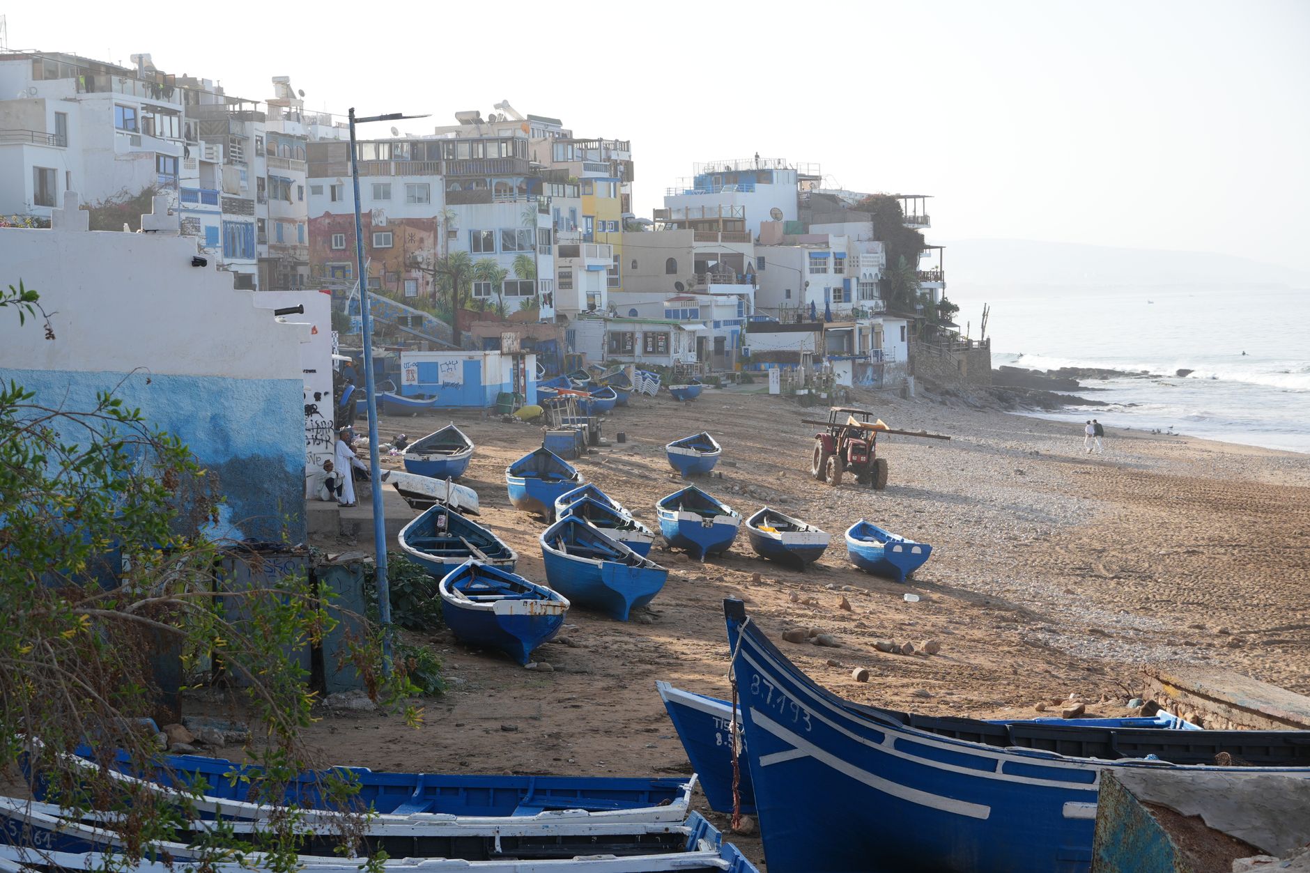 Marokko - Charming seaside view of fishing boats on Taghazout beach, Souss-Massa, Morocco.