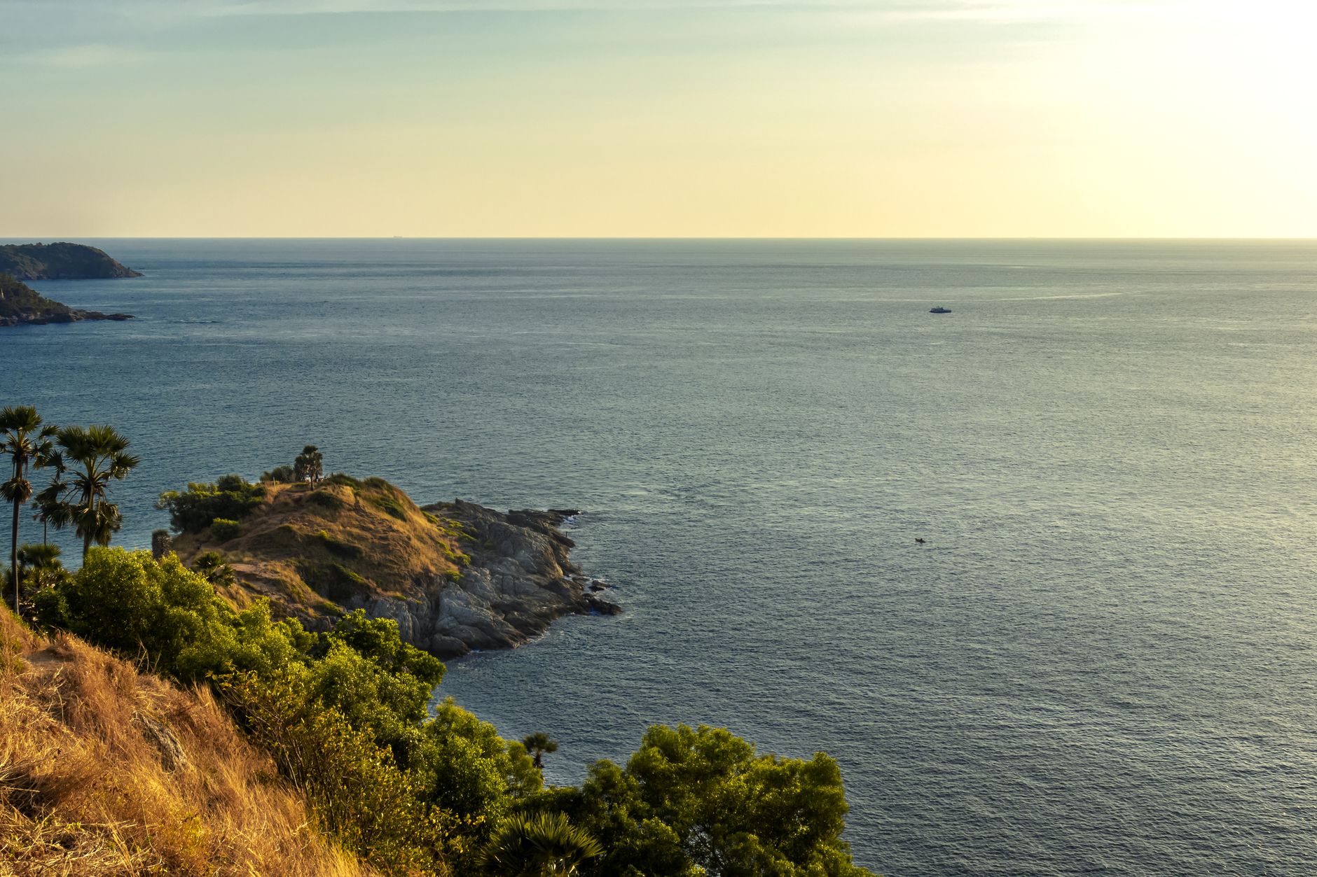 Phuket, Thailand - Breathtaking view of the sea and lush greenery at sunset from Promthep Cape in P