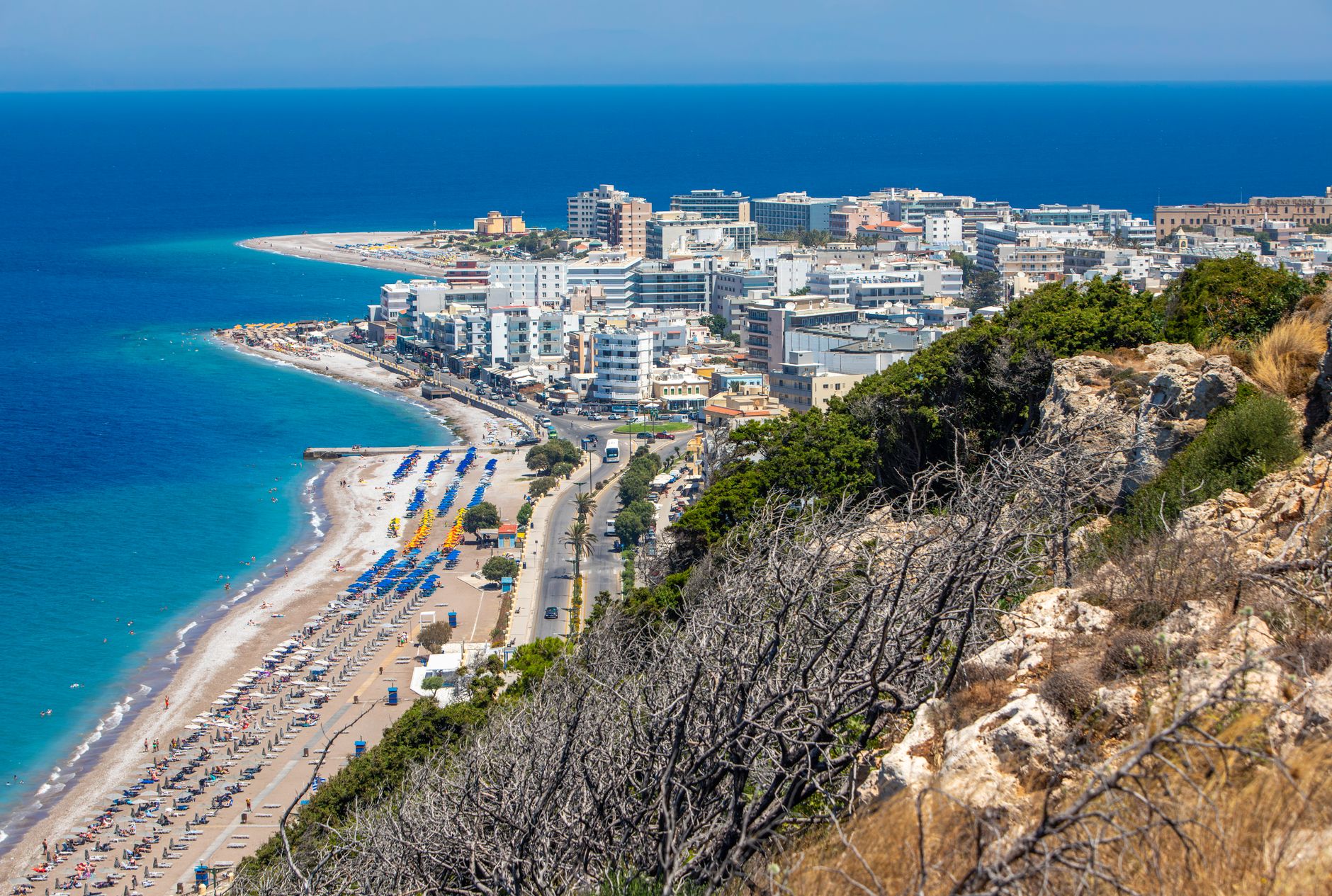 Rhodos - Scenic aerial view of a vibrant beachfront city in Rhodes, Greece, highlighting